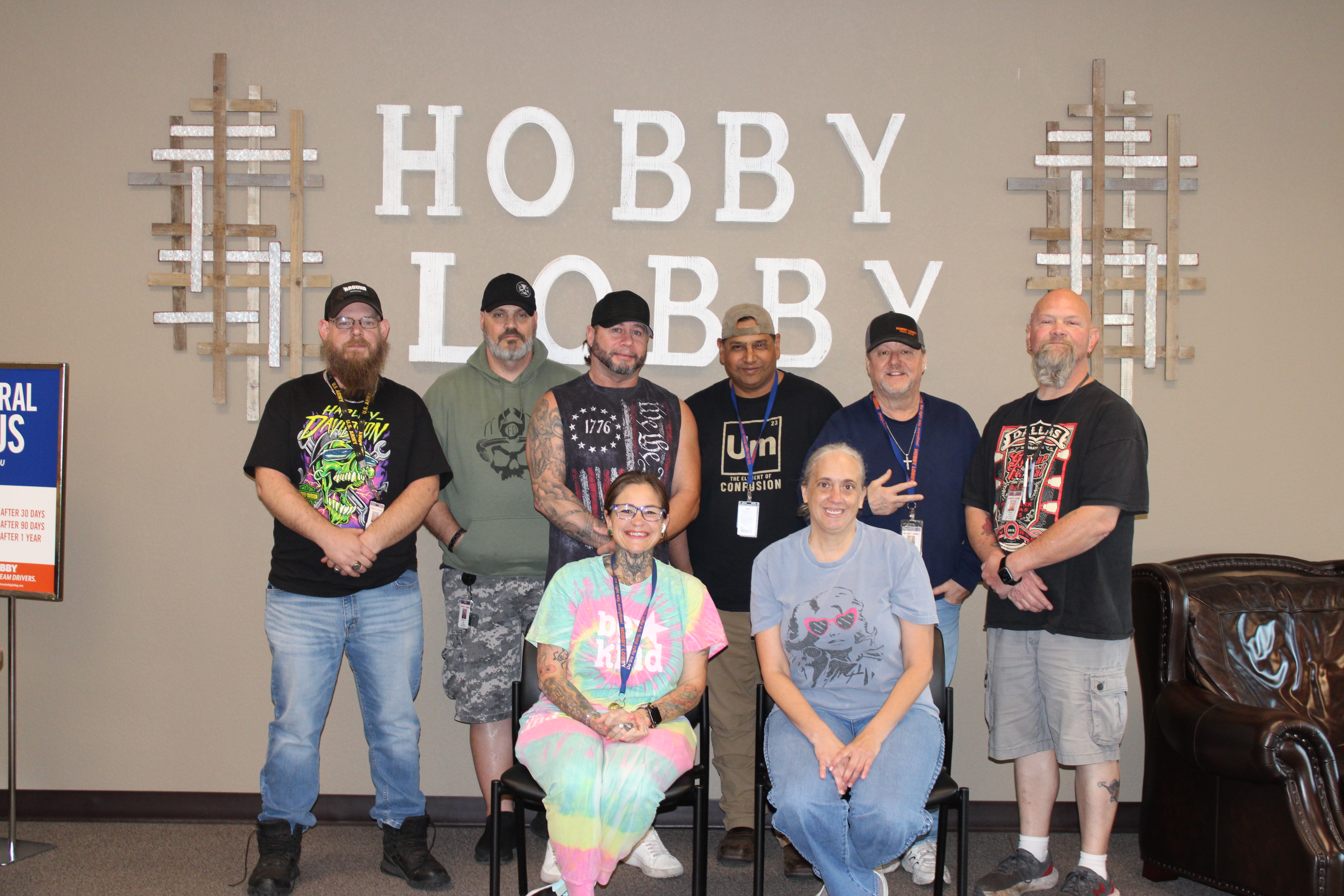 A group of Hobby Lobby truck drivers smiling